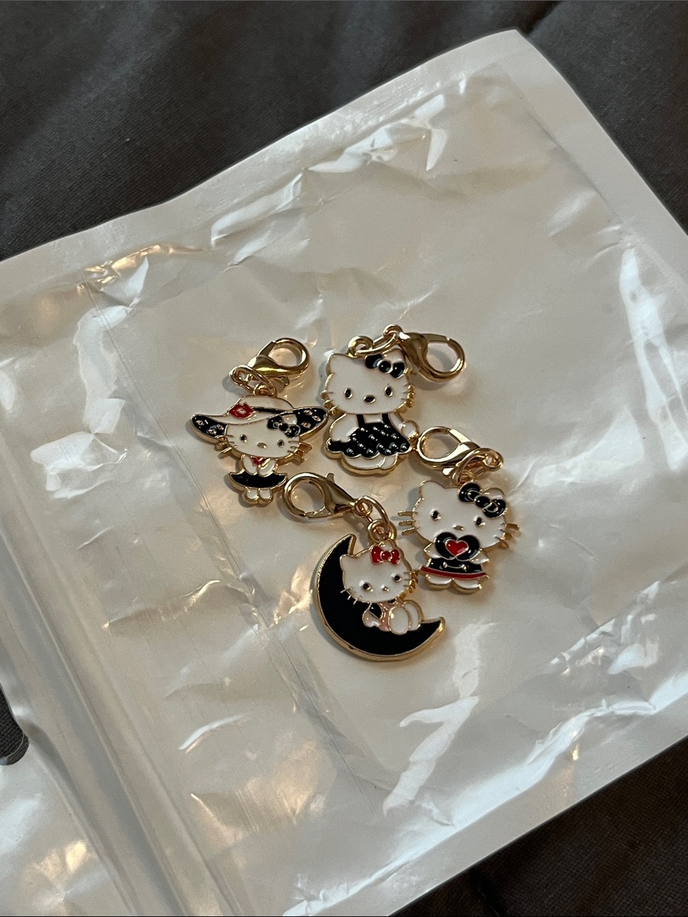 Sanrio Hello Kitty Gold-Tone Black & White Enamel zipper pulls (4)